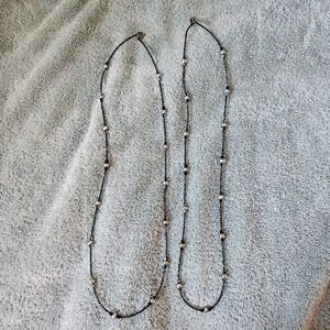 Two pearl and metallic bead necklaces